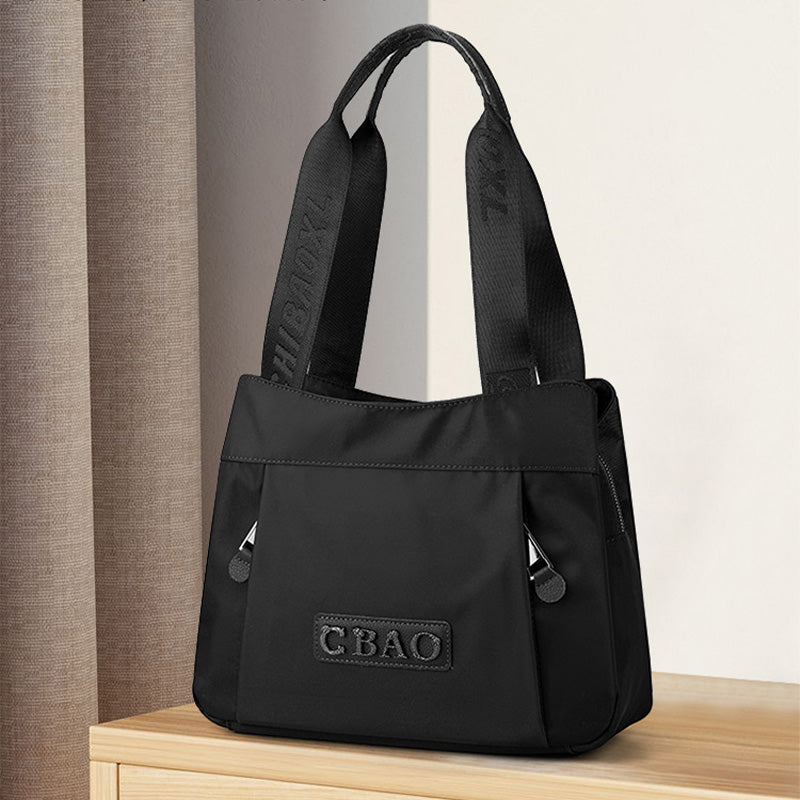 đ„ Crossbody-veske i nylon med stor kapasitet