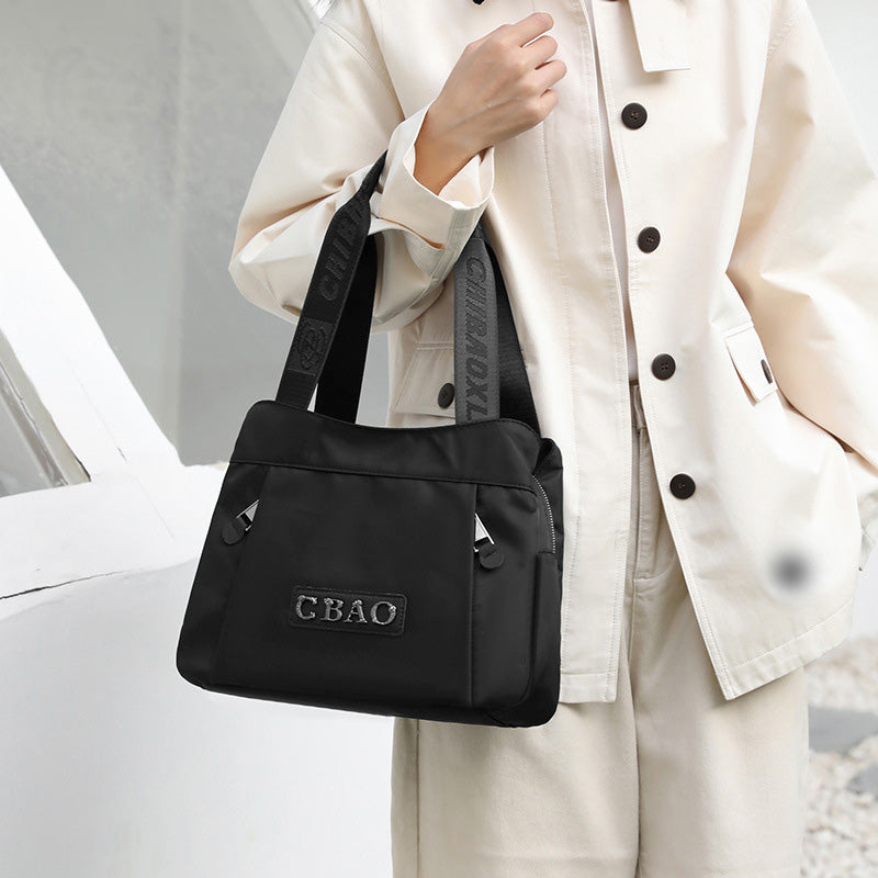 đ„ Crossbody-veske i nylon med stor kapasitet