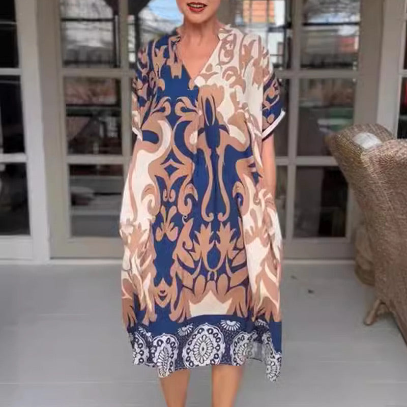 👗 Løs midikjole med V-hals og trykk🦋