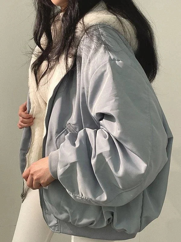 Vendbar oversize fleecejakke med hette