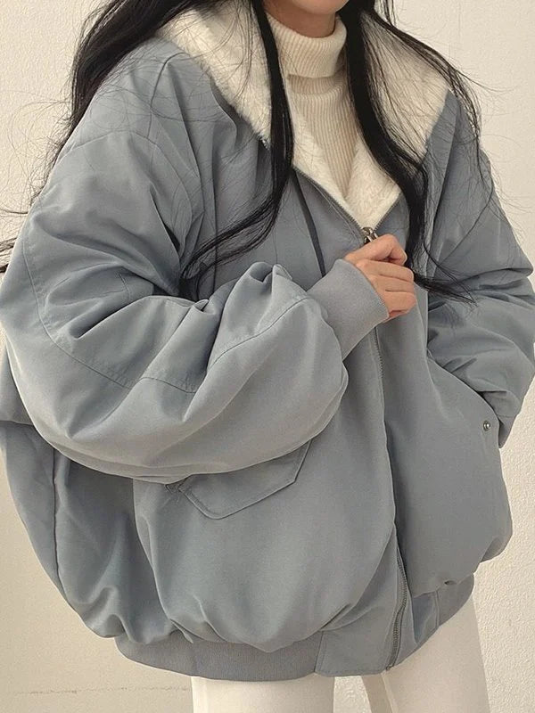 Vendbar oversize fleecejakke med hette
