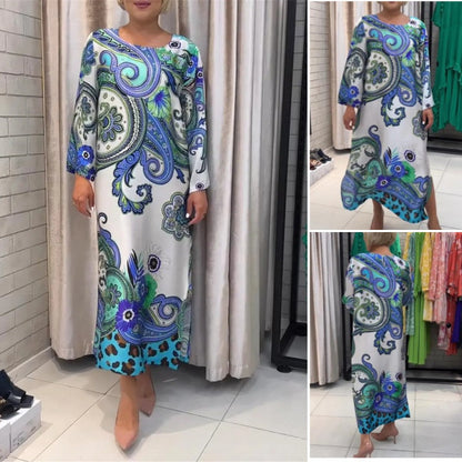 Elegant lang kjole med rund hals og blomsterprint